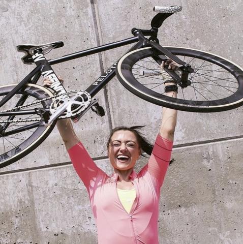 Christine D'Ercole Holding Bike