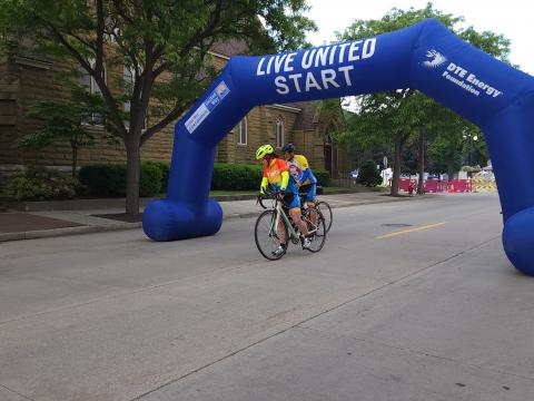 Bicycle Riders starting at finish line.